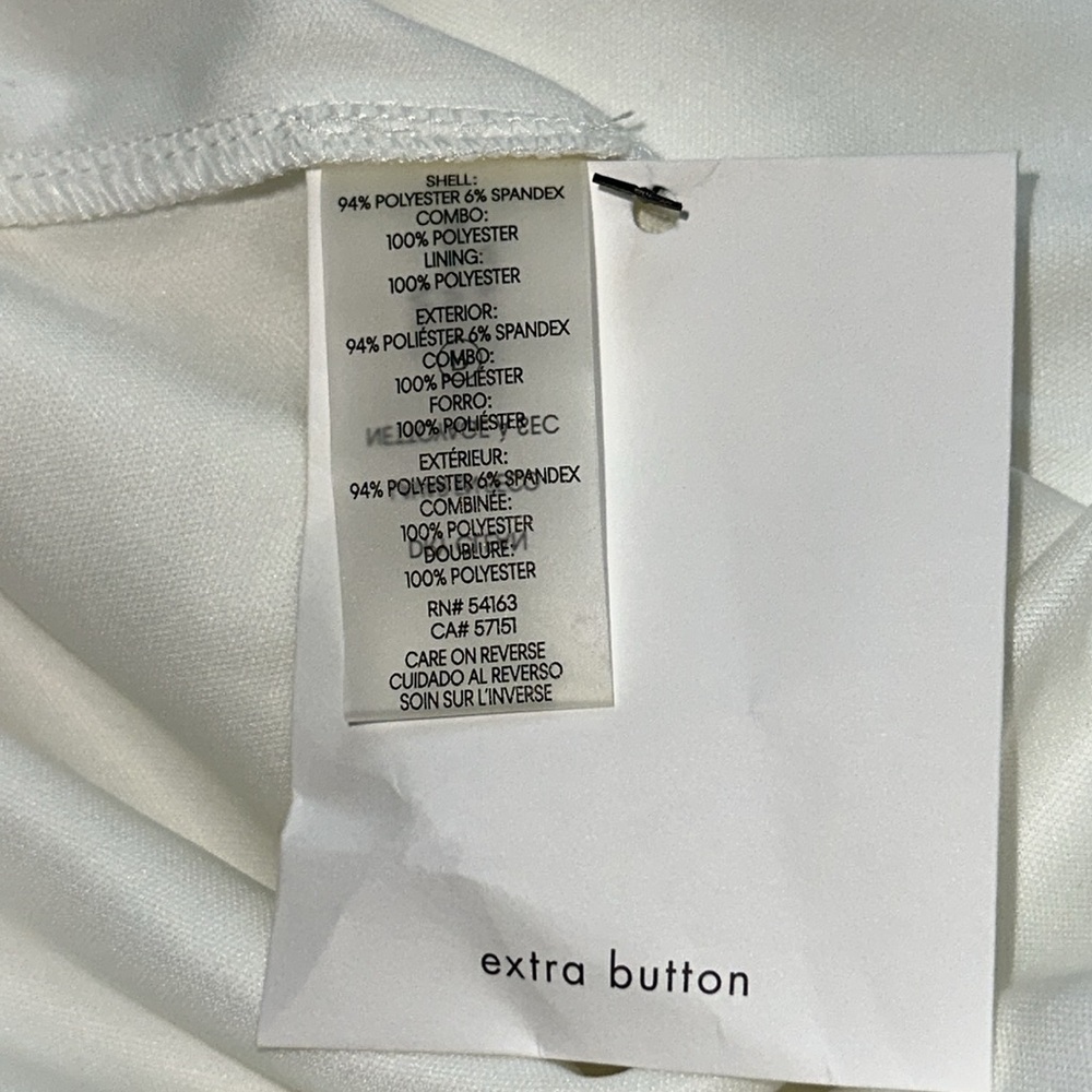 Elegant Calvin Klein White Dress with Flared Sleeves. - Picture 13 of 15